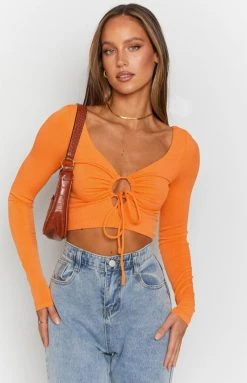Beginning Boutique Trusting Long Sleeve Top Orange