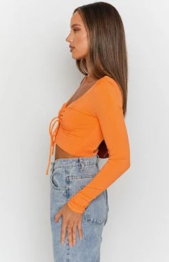 Beginning Boutique Trusting Long Sleeve Top Orange