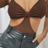 Beginning Boutique Lille Side Cut Out Knit Bodysuit Brown Tops