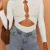 Beginning Boutique Rivian Cut Out Bodysuit White Tops