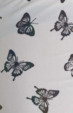 The Volt Mimi White Butterfly Print Flare Pants