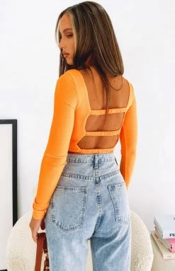 Beginning Boutique Trusting Long Sleeve Top Orange